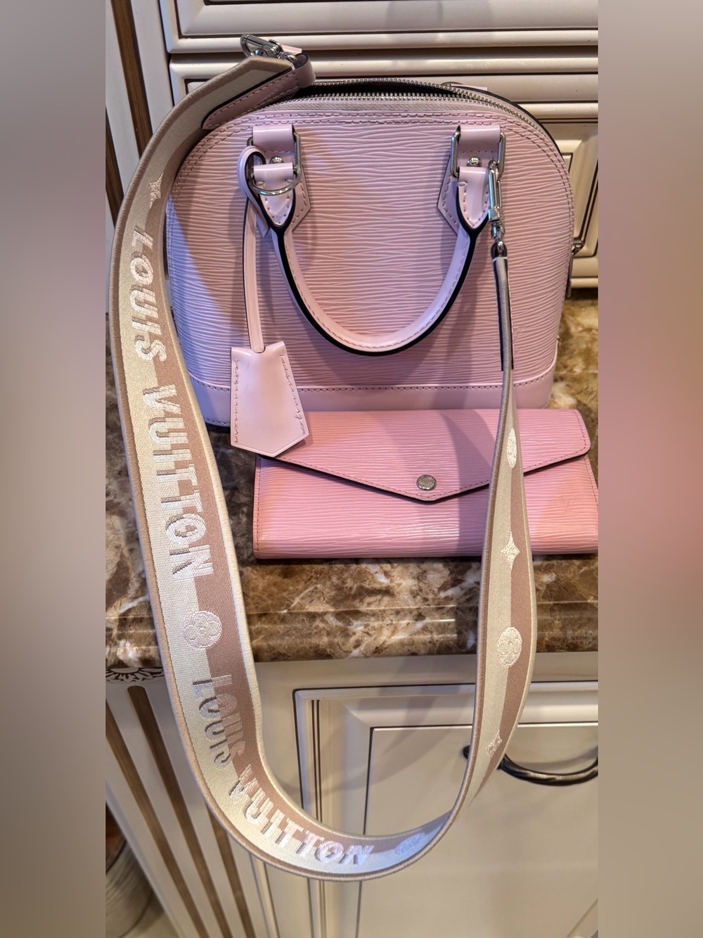 Louis Vuitton Pink Epi Alma BB with Matching Pink Wallet and Branded Strap